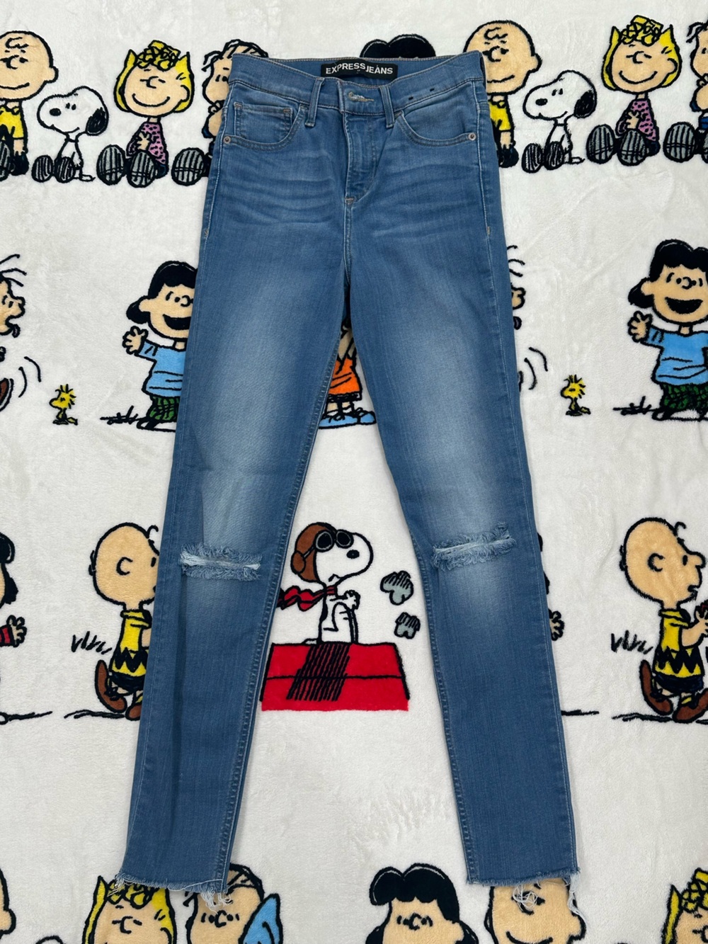EXPRESS Light Wash Distressed Skinny Jeans